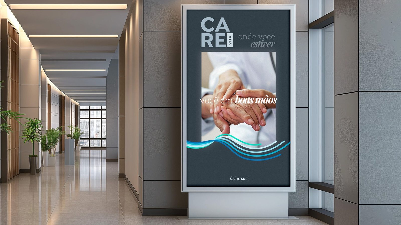 Totem iluminado num corredor de hospital com a marca CARE Vita, a frase onde você estiver, mãos dadas e você em boas mãos